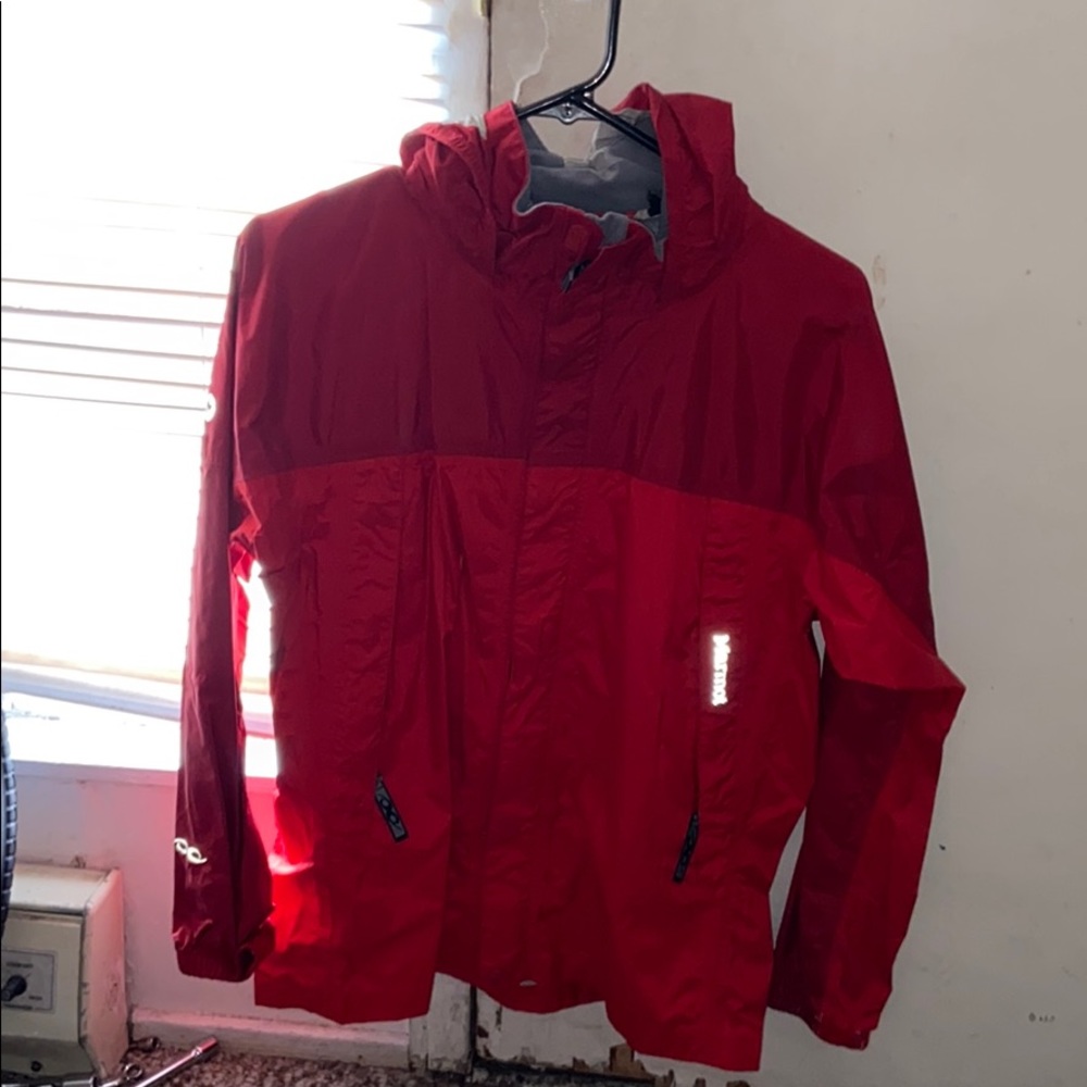 Woman’s Marmot red jacket